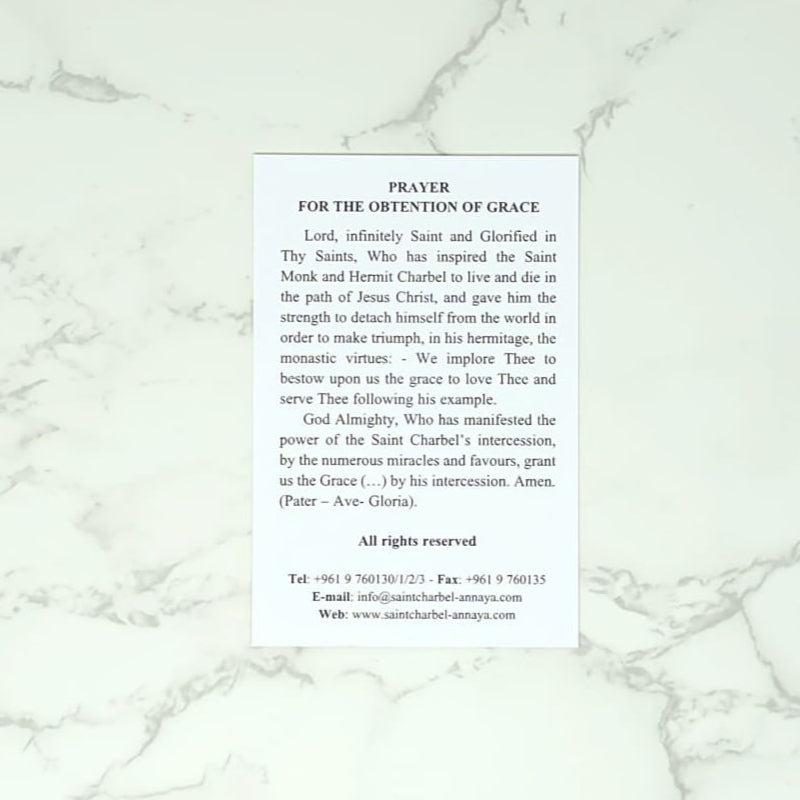 Prayer text on a white marble background