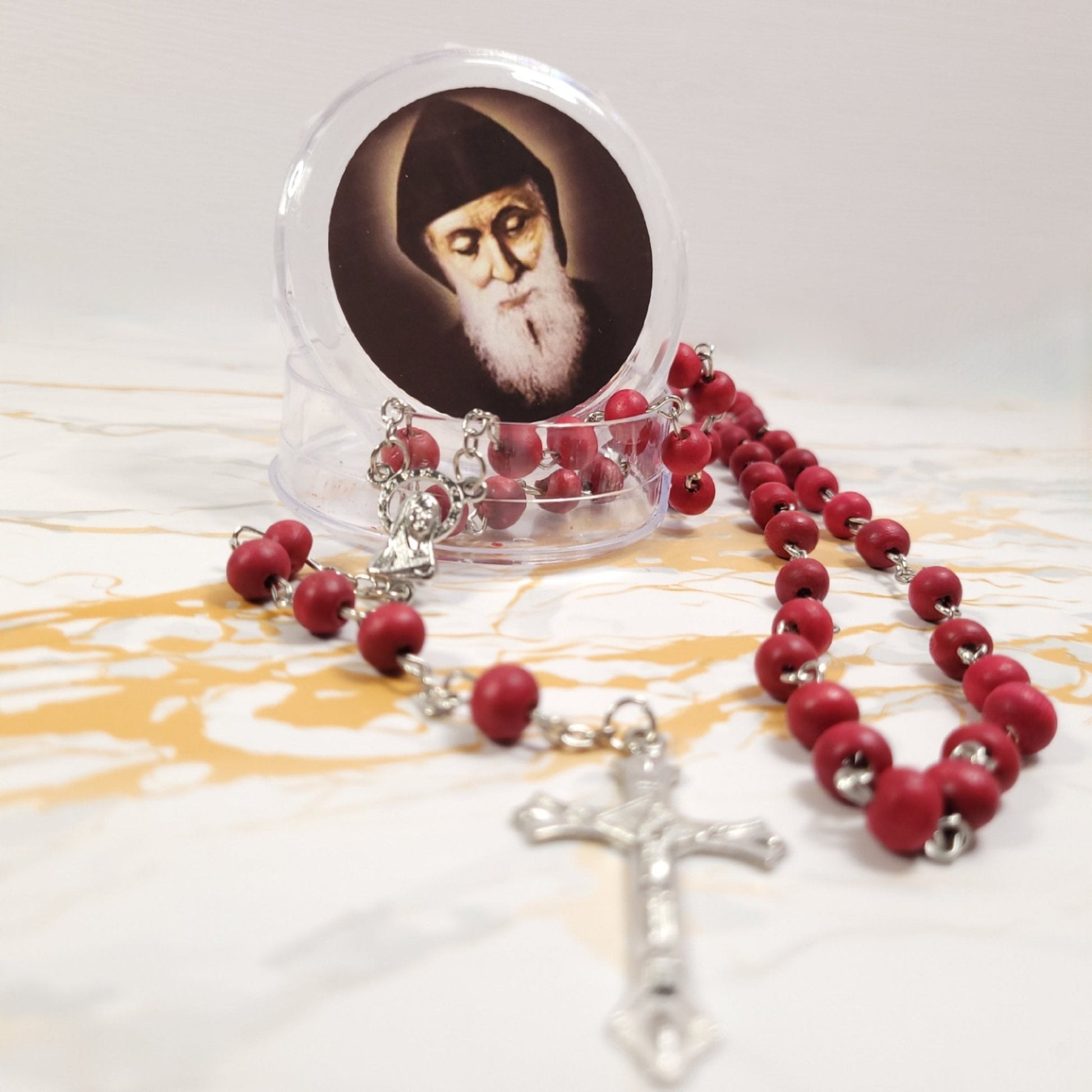 Set of oil, water, incense, soil, relic, rosary and novena booklet of Saint Charbel - Our Lady of Gifts