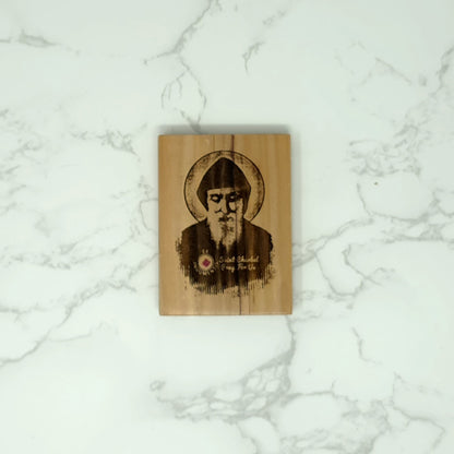 Wooden stamp with a printed design on a marble surface