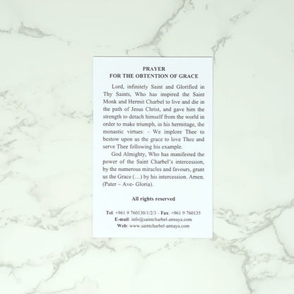 Prayer text on a white marble background