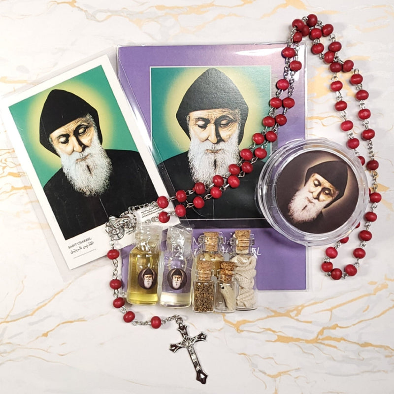Set of oil, water, incense, soil, relic, rosary and novena booklet of Saint Charbel